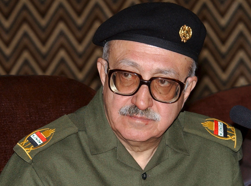 Iraqi Deputy Prime Minister Tariq Aziz speaks to an Egyptian delegation in Baghdad, in this February 25, 2003 file photo (Reuters photo)